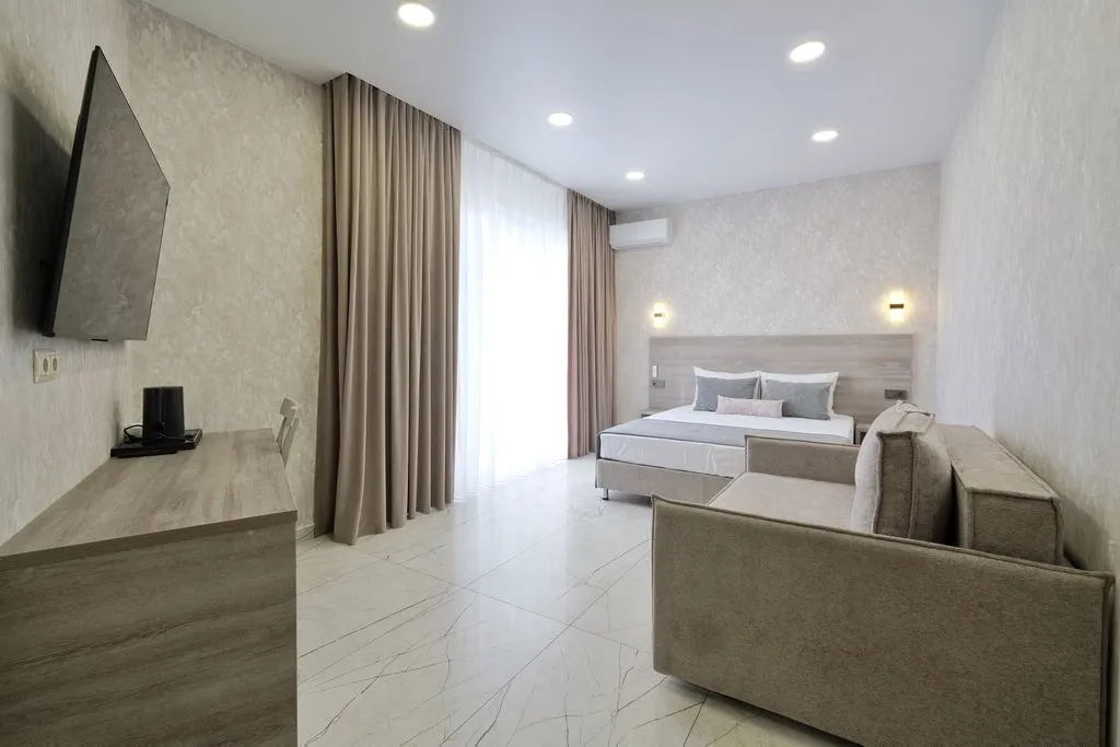 Четырехместный номер Делюкс