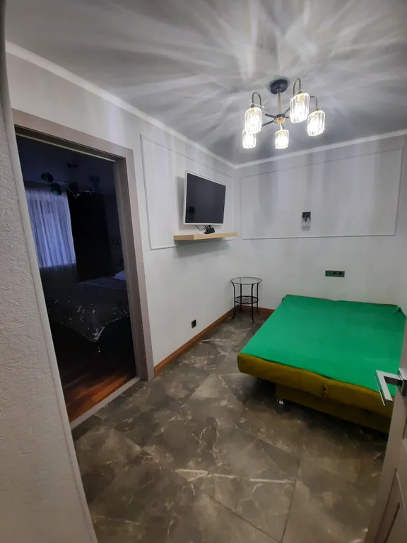 Квартира двухкомнатная на улице Еськова, 50 м², Кисловодск — спальня, фото 2