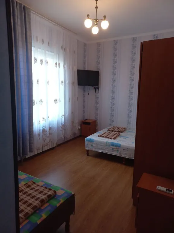 Двухместный номер с 2 отдельными кроватями стандарт с видом на город — общий вид