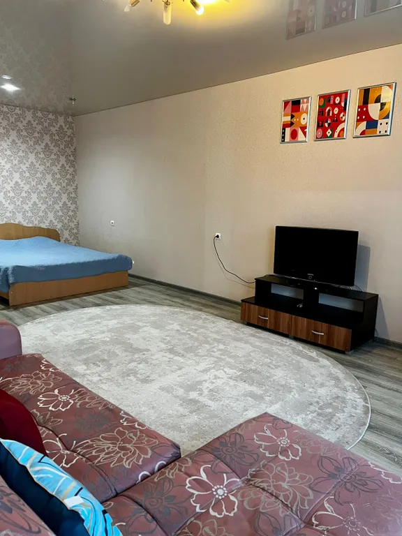 Квартира однокомнатная на улице Полевой, 50 м², Кстово — спальня, фото 5