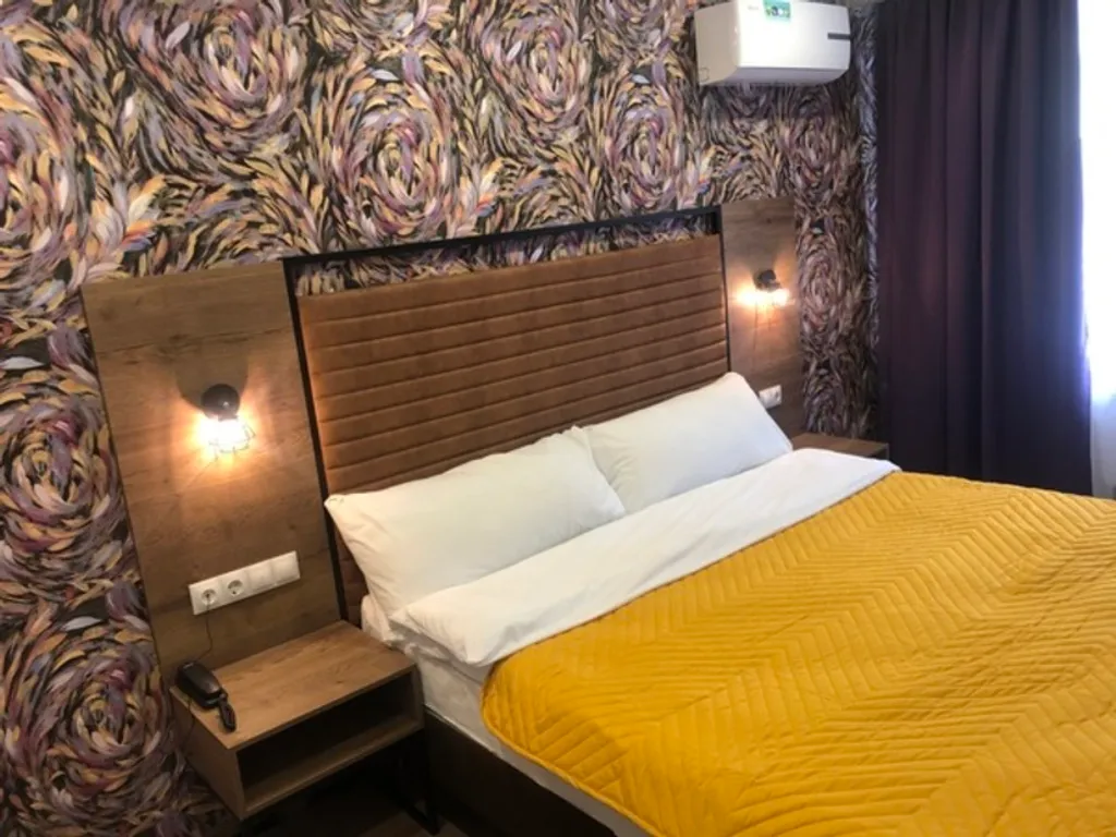 Четырёхместный номер люкс с балконом