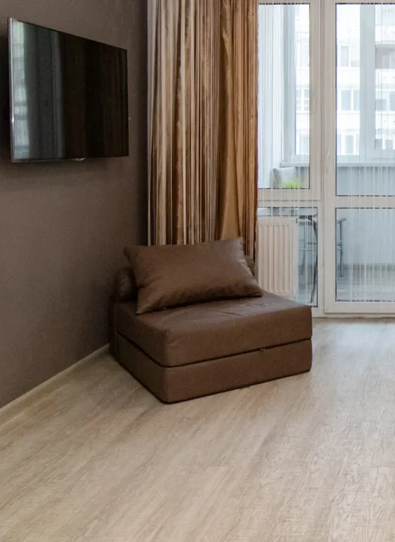 Квартира однокомнатная на улице Пархоменко, 40 м², Тюмень — спальня