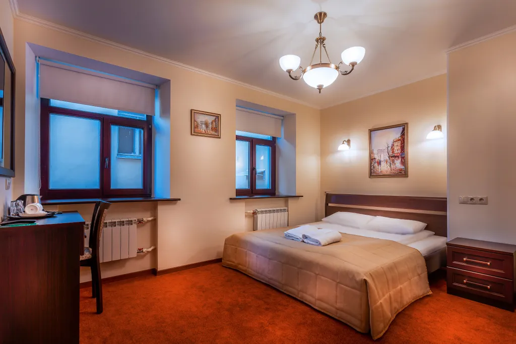 Номер повышенной комфортности с кроватью кинг-сайз и джакузи