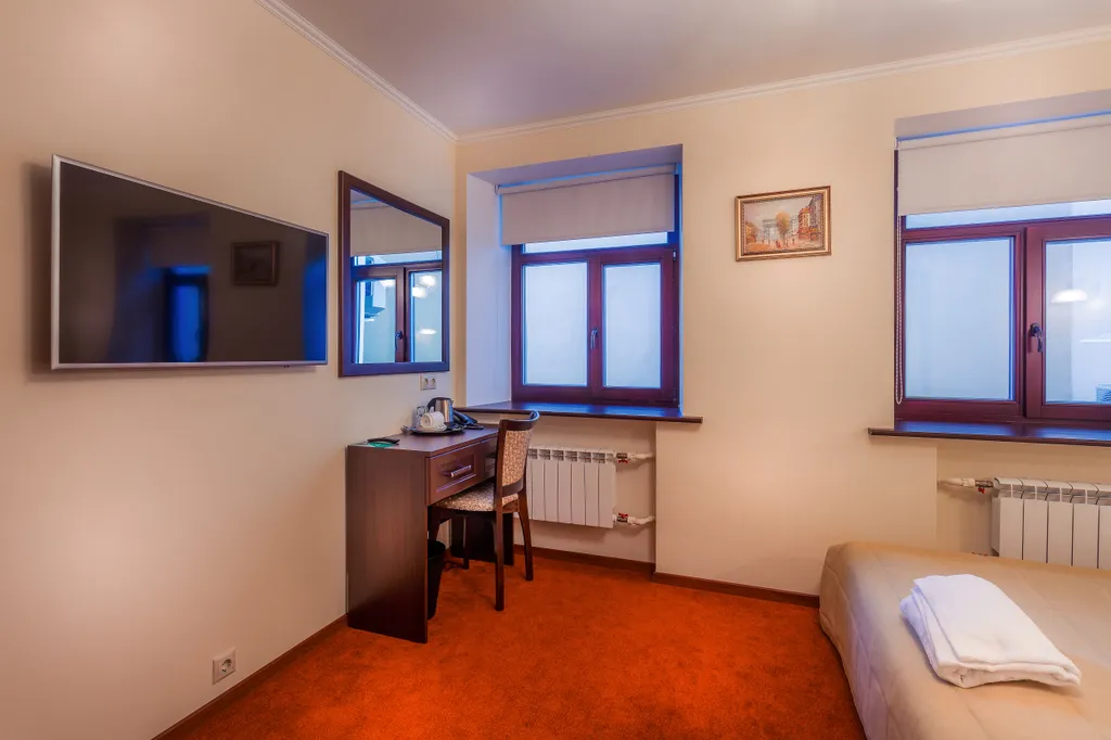 Номер повышенной комфортности с кроватью кинг-сайз и джакузи