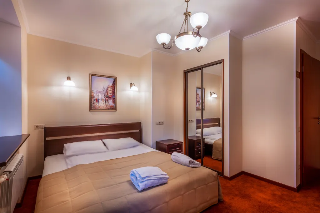 Номер повышенной комфортности с кроватью кинг-сайз и джакузи