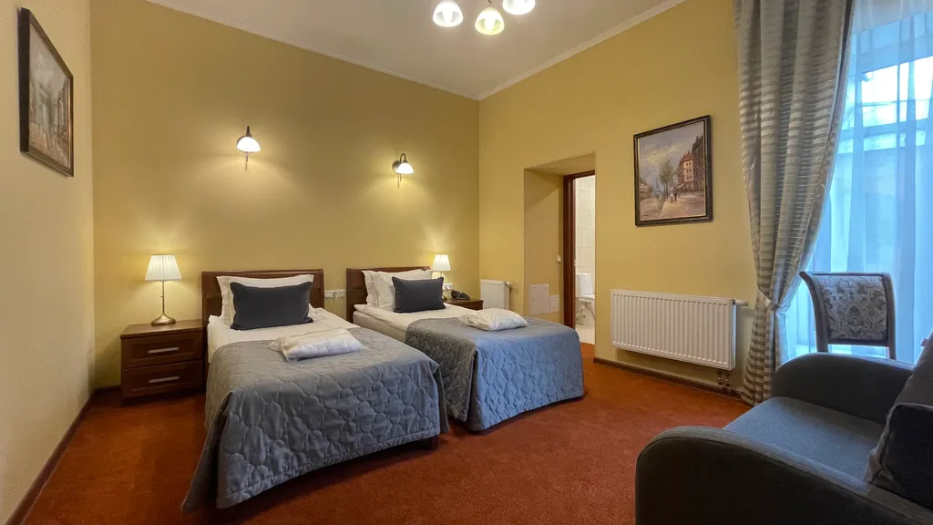 Двухместный с 2 отдельными кроватями улучшенный