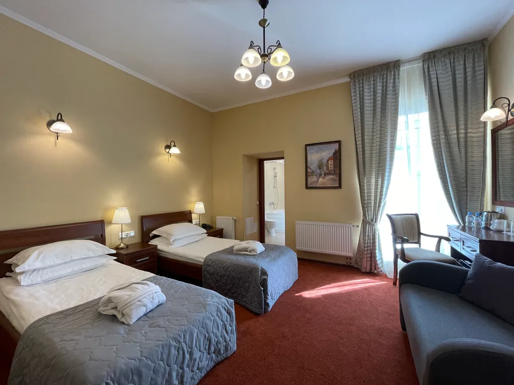 Двухместный с 2 отдельными кроватями улучшенный