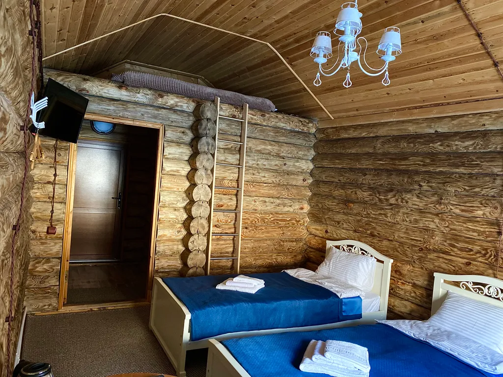 Дом с тремя 1-но спальными кроватями и футоном