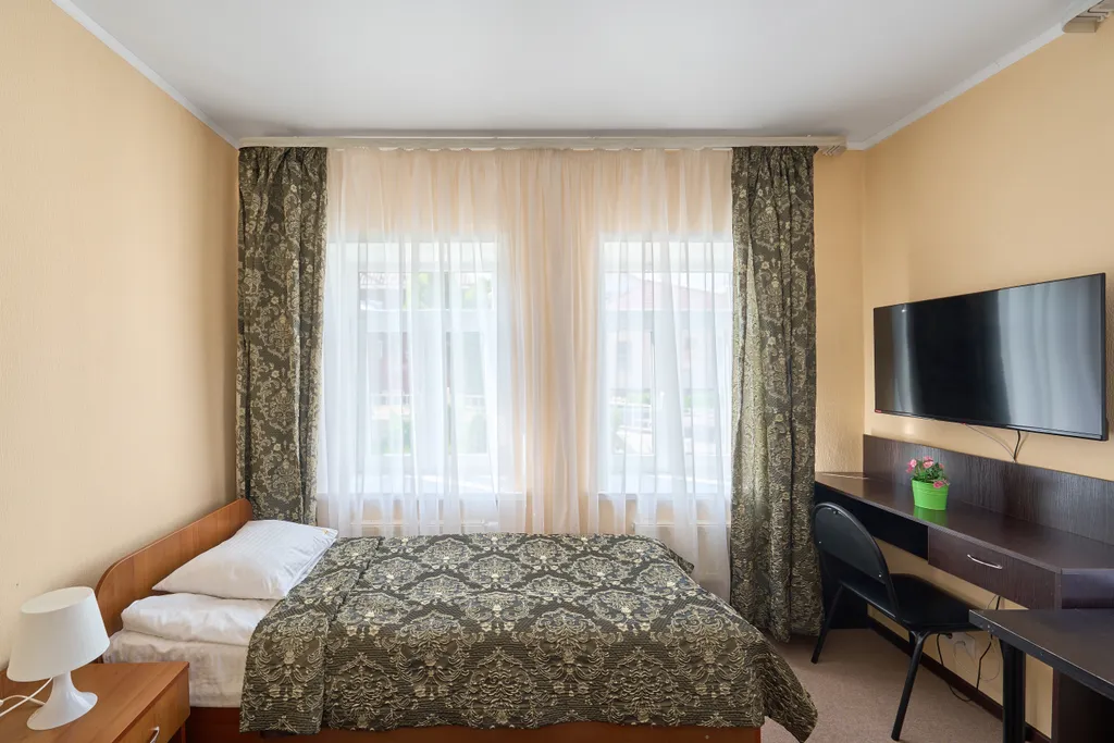 Двухместный номер с 2 отдельными кроватями с кухней — Подворье, фото 3 из 5