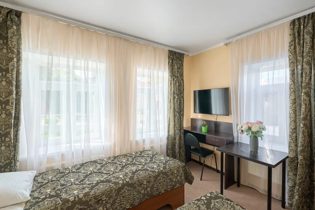 Двухместный номер с 2 отдельными кроватями с кухней — Подворье, фото 4 из 5