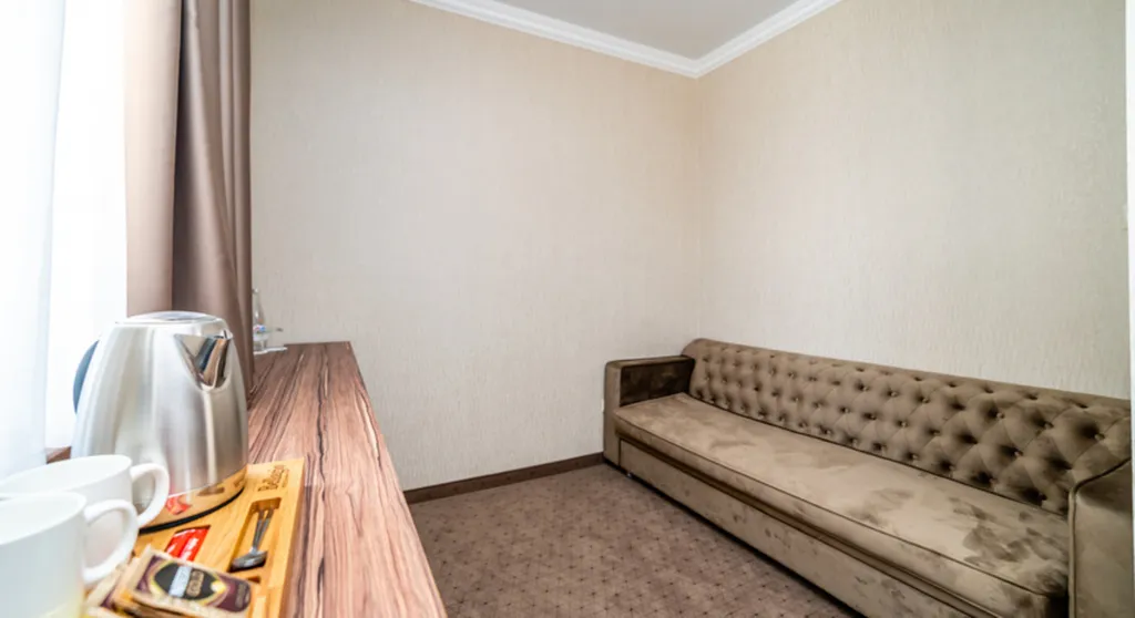 Трёхместный номер полулюкс Junior Suite