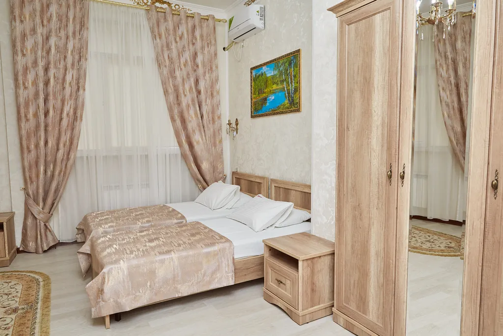 Двухместный номер с 2 отдельными кроватями улучшенный — Тархо, фото 1 из 5