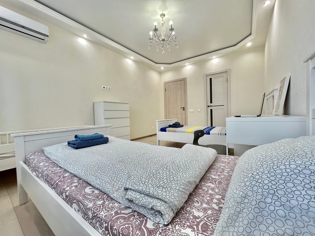 Апартаменты трёхкомнатные в Вахитовском, 100 м², Казань — спальня, фото 10