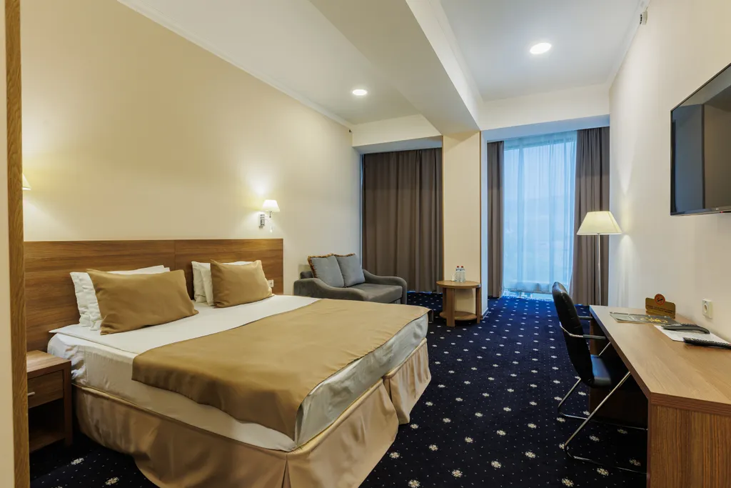 Двухместный номер с 1 кроватью junior suite — спальное место