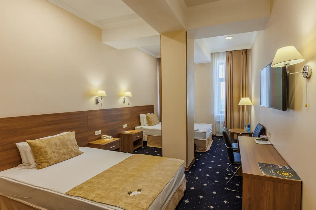 Двухместный номер с 2 отдельными кроватями Junior Suite Twin — спальное место