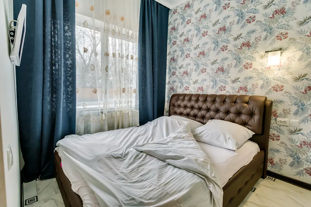 Квартира однокомнатная на улице Варфоломеева, 48 м², Ростов-на-Дону — спальня, фото 6