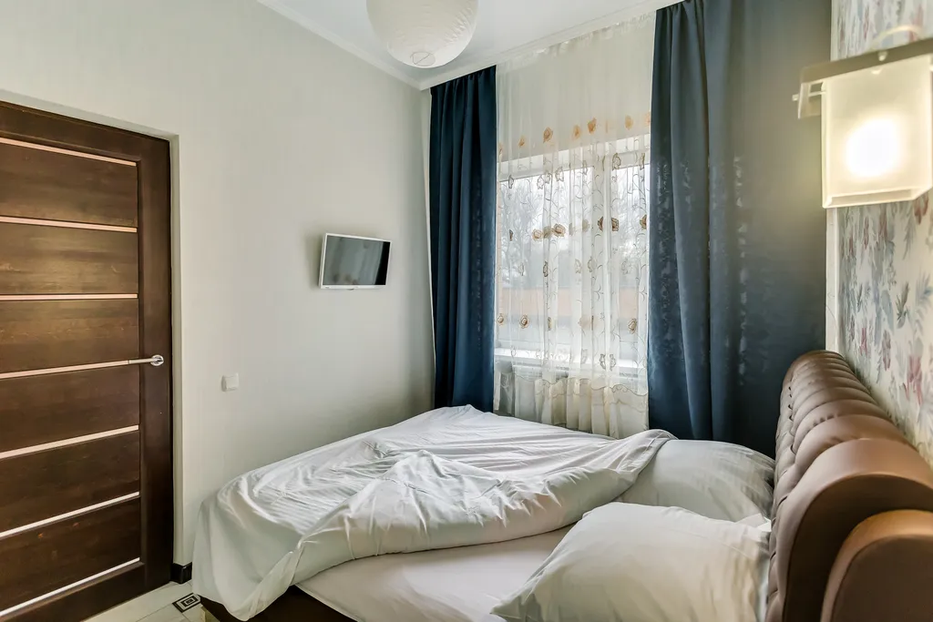 Квартира однокомнатная на улице Варфоломеева, 48 м², Ростов-на-Дону — спальня, фото 8