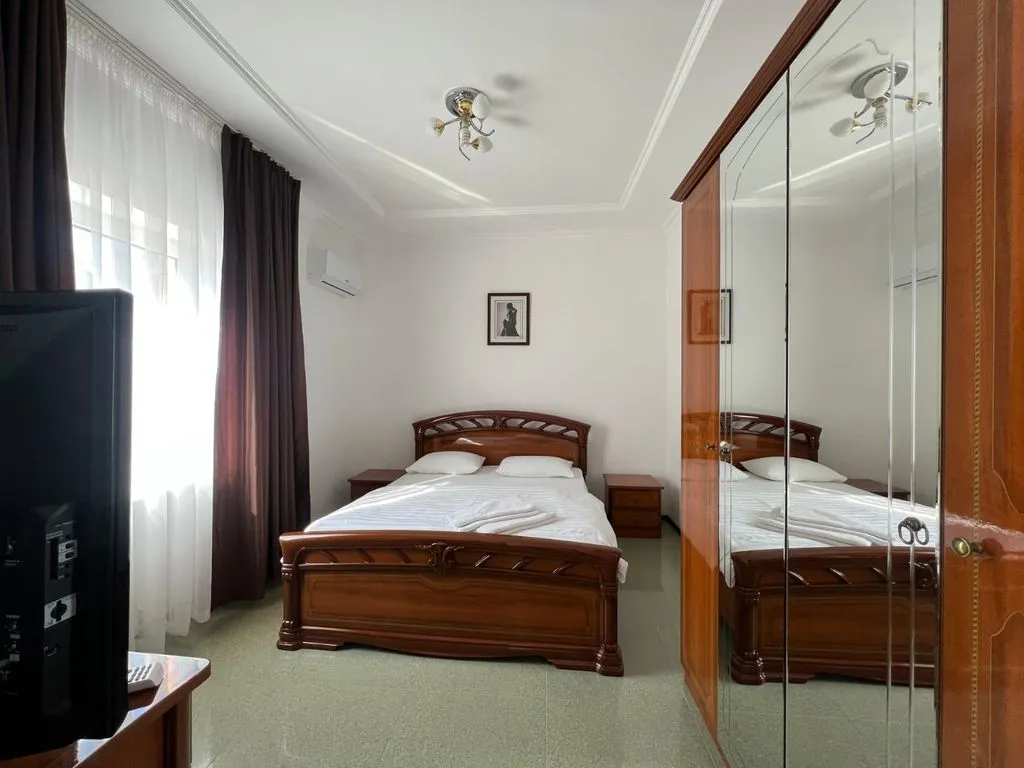 Семейный номер люкс с видом на город