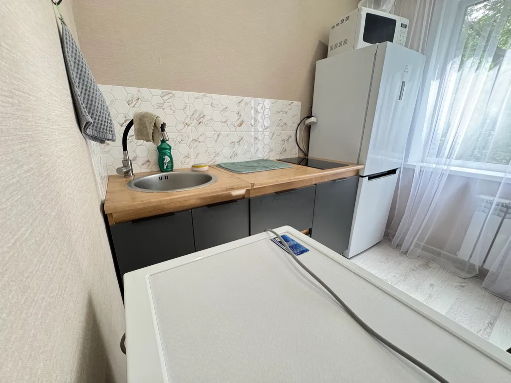 Квартира однокомнатная на улице Толбухина, 31 м², Усолье-Сибирское — кухня, фото 2