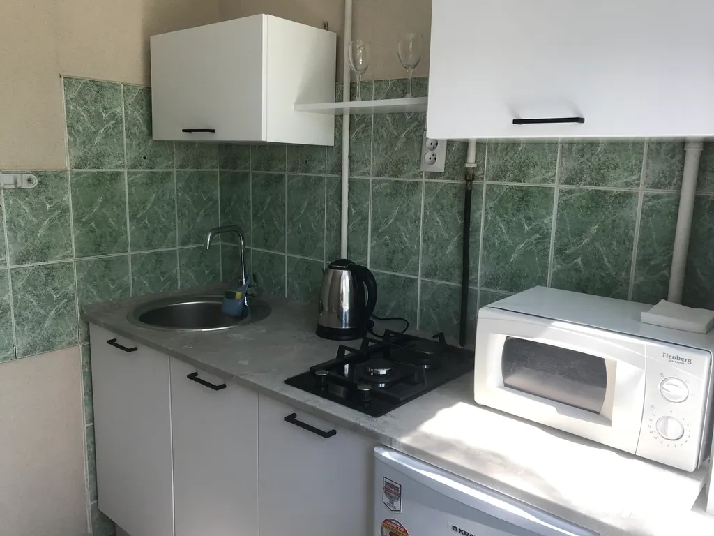 Квартира двухкомнатная в микрорайоне 2-й, 52 м², Кстово — кухня, фото 2