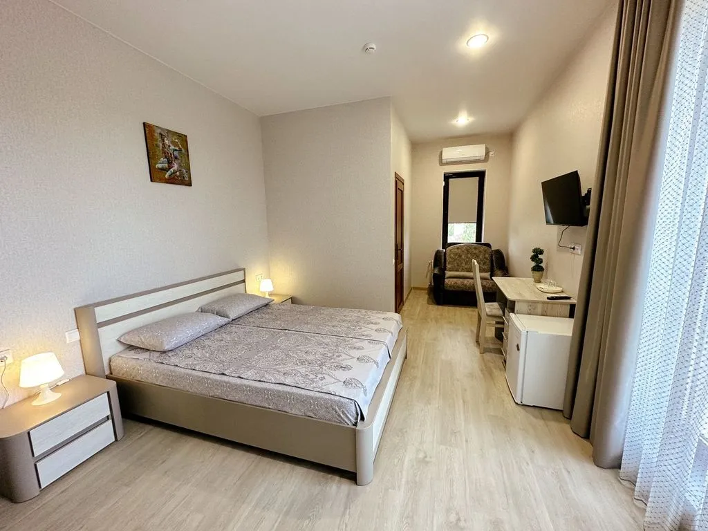 Трёхместный номер люкс с видом на море