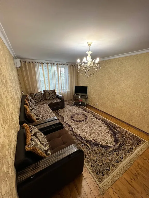Квартира двухкомнатная на проспекте Петра I, 52 м², Махачкала — спальня, фото 2