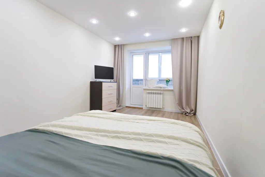 Квартира двухкомнатная на бульваре Олега Волкова, 52 м², Чебоксары — спальня, фото 10