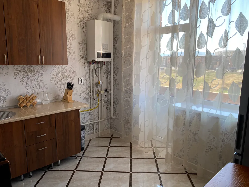 Квартира двухкомнатная на улице Кавказкой, 63 м², Каспийск — фото 12
