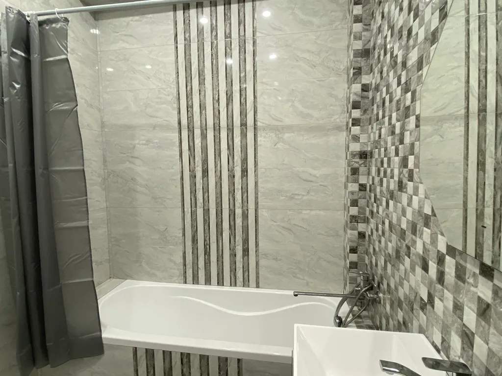 Квартира двухкомнатная на улице Кавказкой, 63 м², Каспийск — фото 17