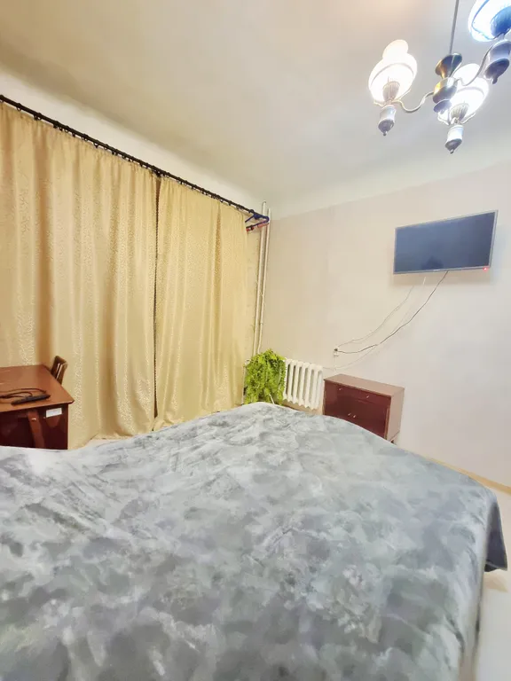 Квартира двухкомнатная на улице Пушкинской, 65 м², Ростов-на-Дону — спальня, фото 2