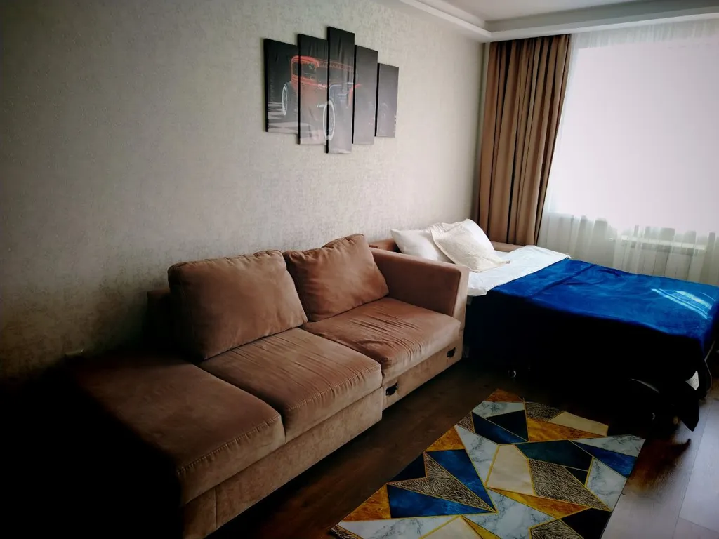 Квартира однокомнатная на улице Радужной, 45 м², Чебоксары — спальня, фото 3