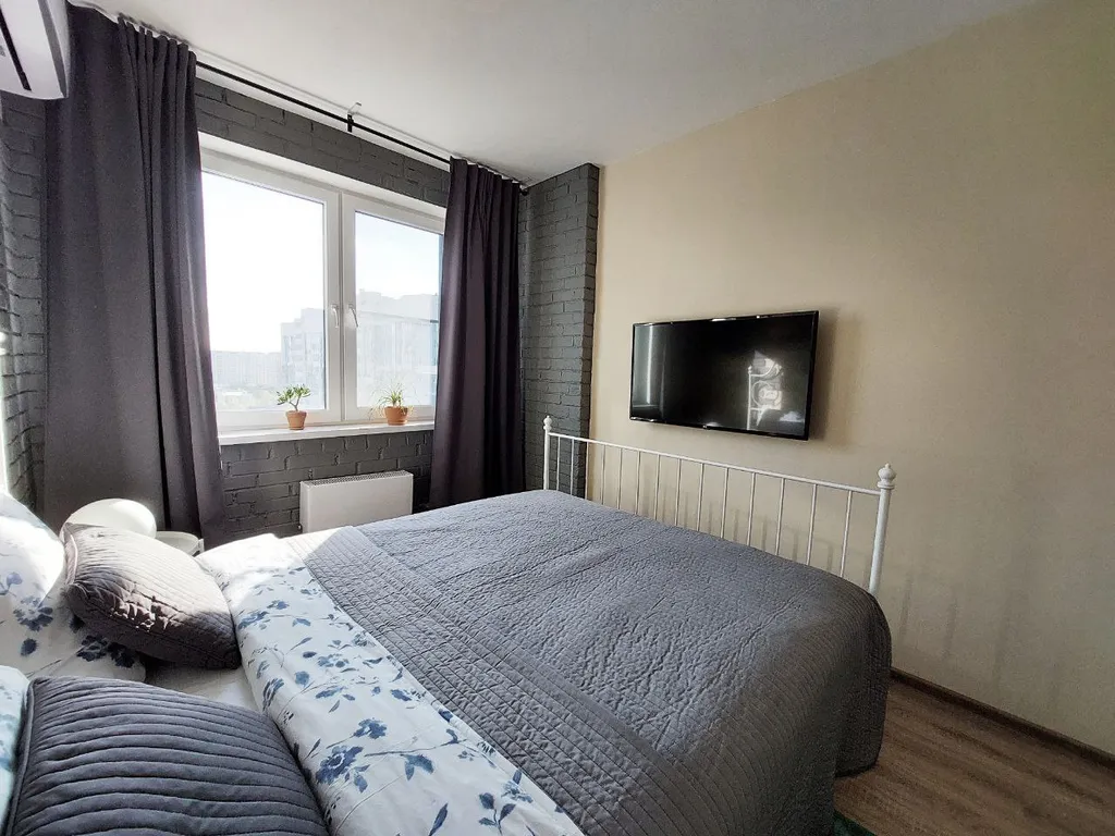 Квартира двухкомнатная на улице Колычева, 36 м², Лобня — спальня, фото 3