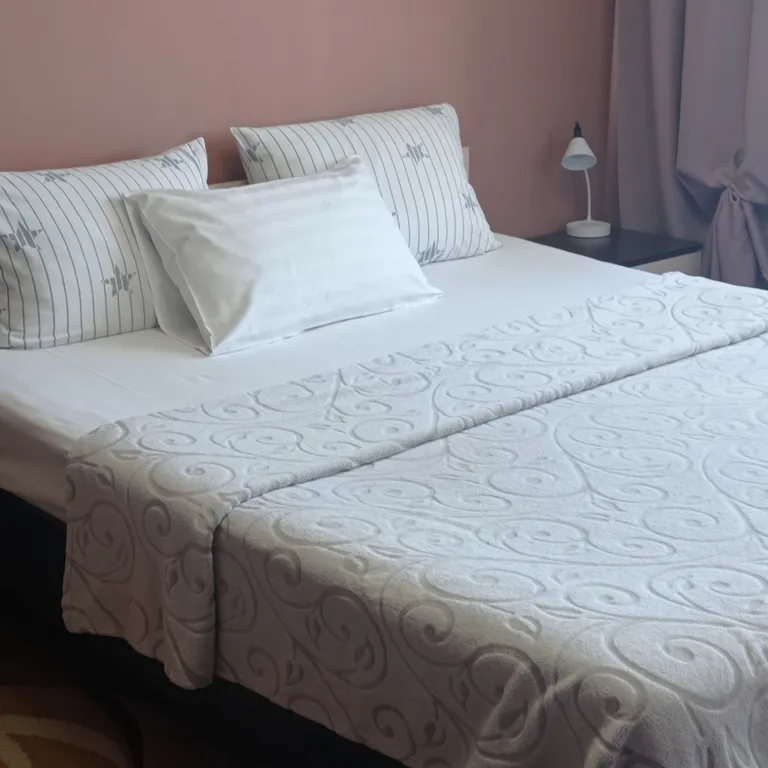 Квартира однокомнатная в Октябрьском, 46 м², Иркутск — спальня, фото 2