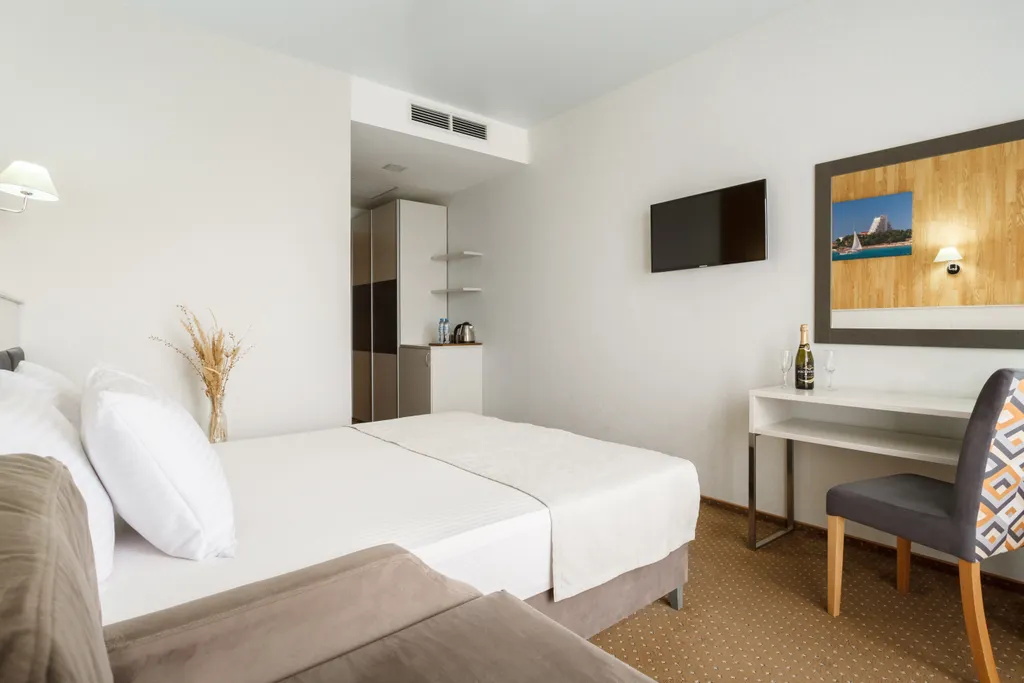 Двухместный номер с 2 отдельными кроватями стандарт — Sunmarinn Resort Hotel, фото 4 из 5