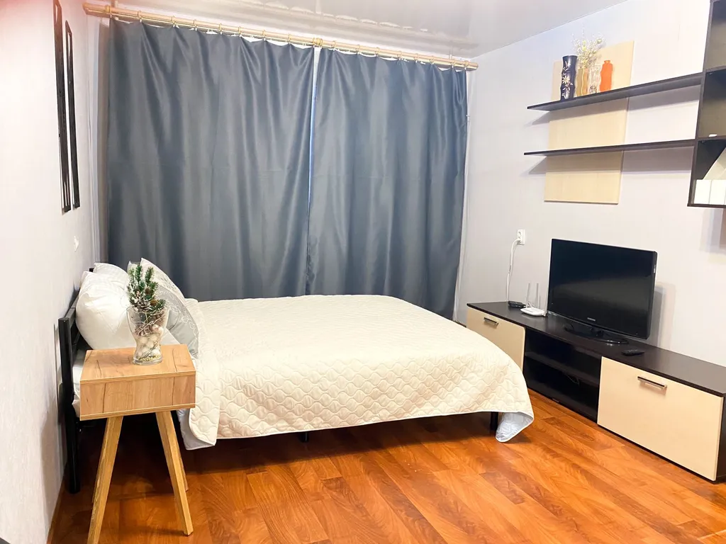 Квартира однокомнатная на улице Островского, 33 м², Кстово — спальня, фото 3