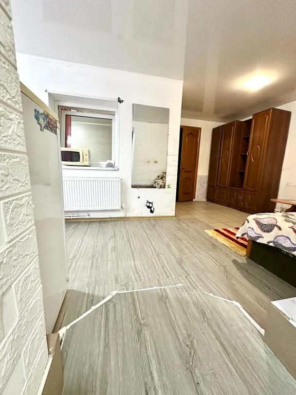 Квартира двухкомнатная на улице Октябрьской, 49 м², Джанкой — спальня, фото 14