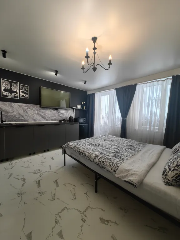 Студия однокомнатная в Октябрьском, 24 м², Новосибирск — спальня, фото 3