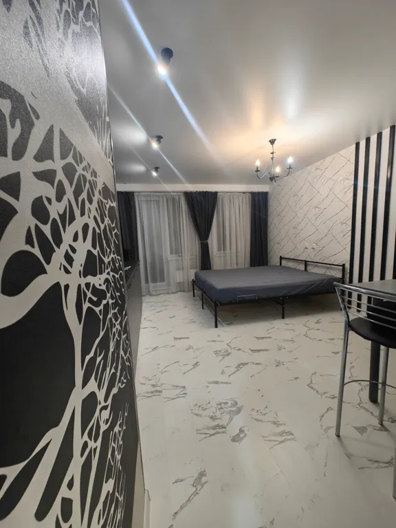 Студия однокомнатная в Октябрьском, 24 м², Новосибирск — спальня, фото 4