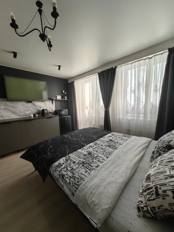 Студия однокомнатная в Октябрьском, 24 м², Новосибирск — спальня, фото 2