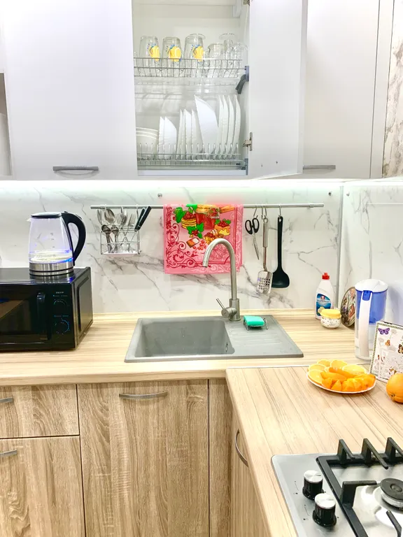 Квартира однокомнатная на улице Одесской, 34 м², Тюмень — кухня, фото 6