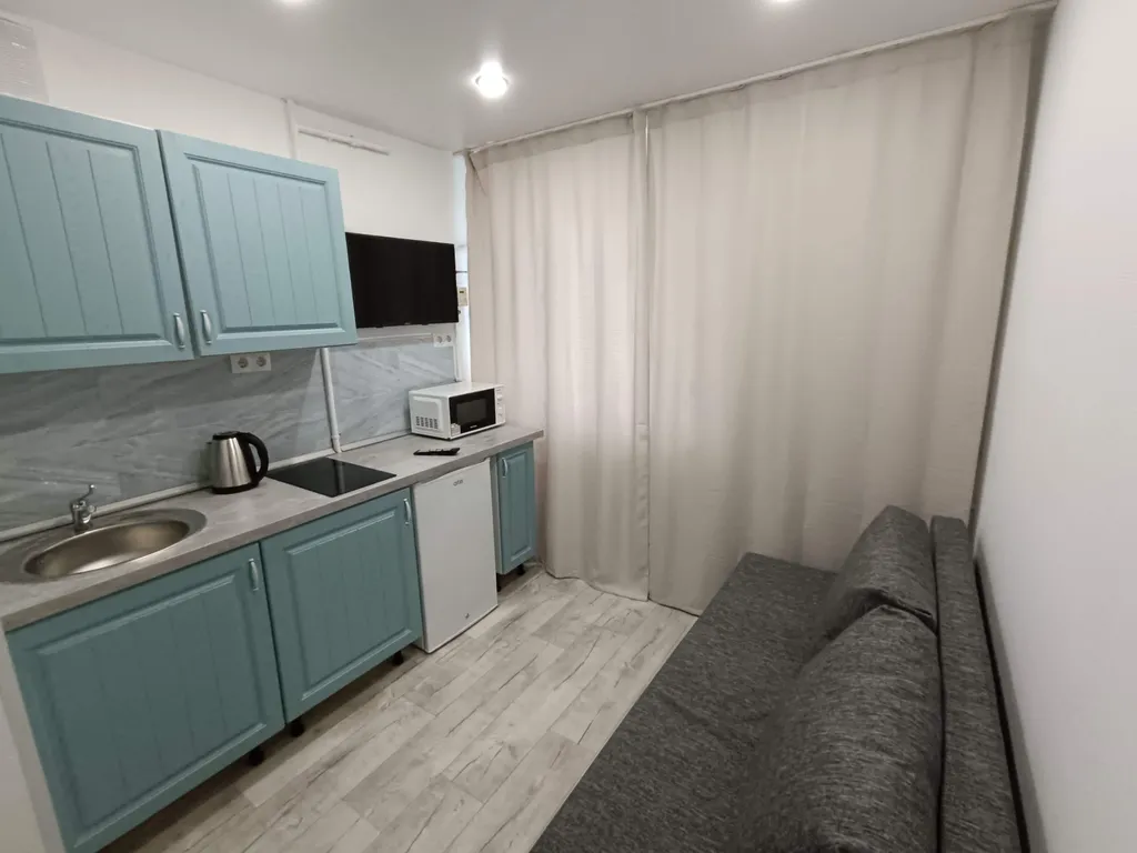 Студия однокомнатная на улице Киевской, 18 м², Тюмень — кухня, фото 2