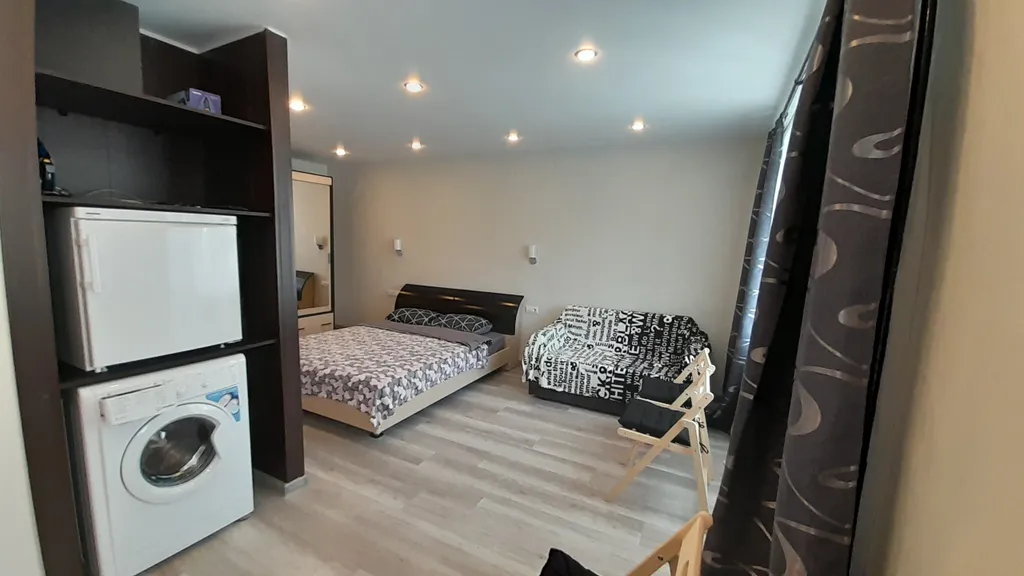 Студия однокомнатная на улице Ньютоне, 30 м², Ярославль — спальня, фото 4