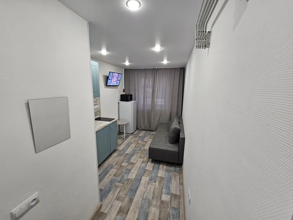 Студия однокомнатная на улице Киевской, 18 м², Тюмень — спальня