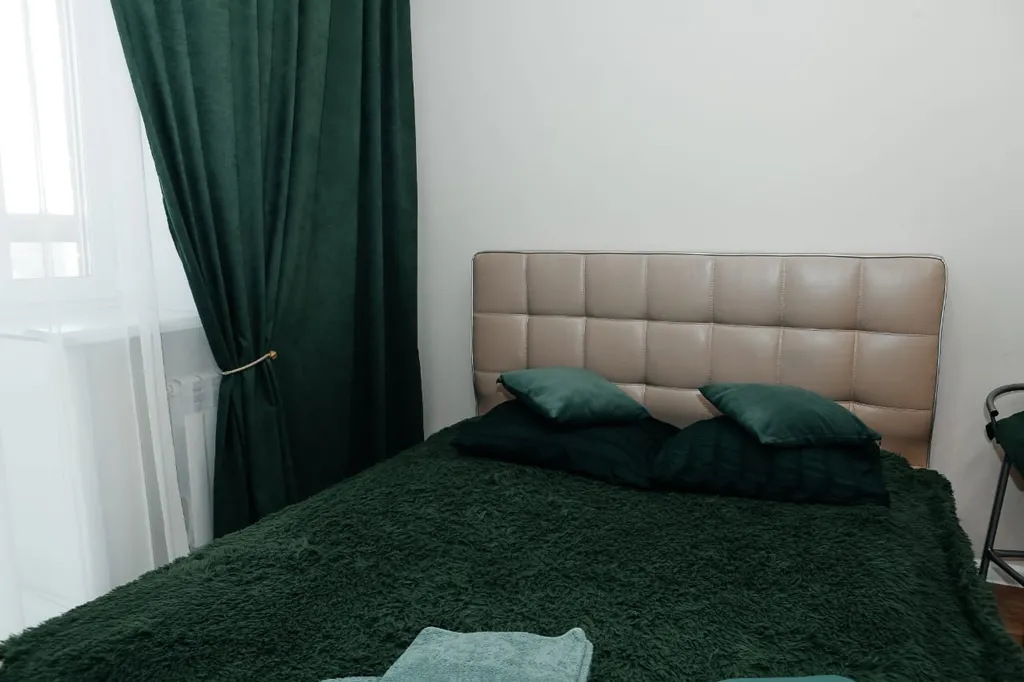 Студия однокомнатная в переулке Археолога Михаила Герасимова, 30 м², Иркутск — спальня, фото 4