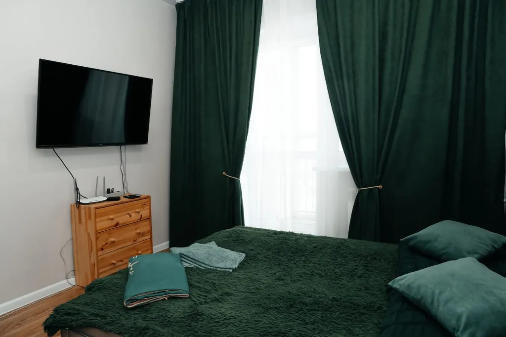 Студия однокомнатная в переулке Археолога Михаила Герасимова, 30 м², Иркутск — спальня, фото 5