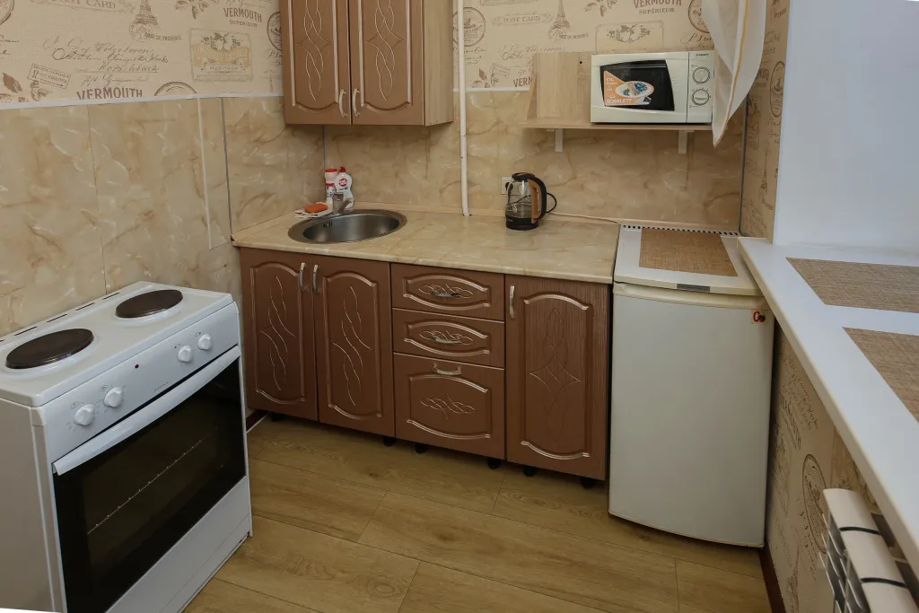 Квартира однокомнатная на улице Республики, 36 м², Тюмень — кухня, фото 2