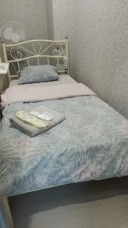 Одноместный номер без окна с общими удобствами