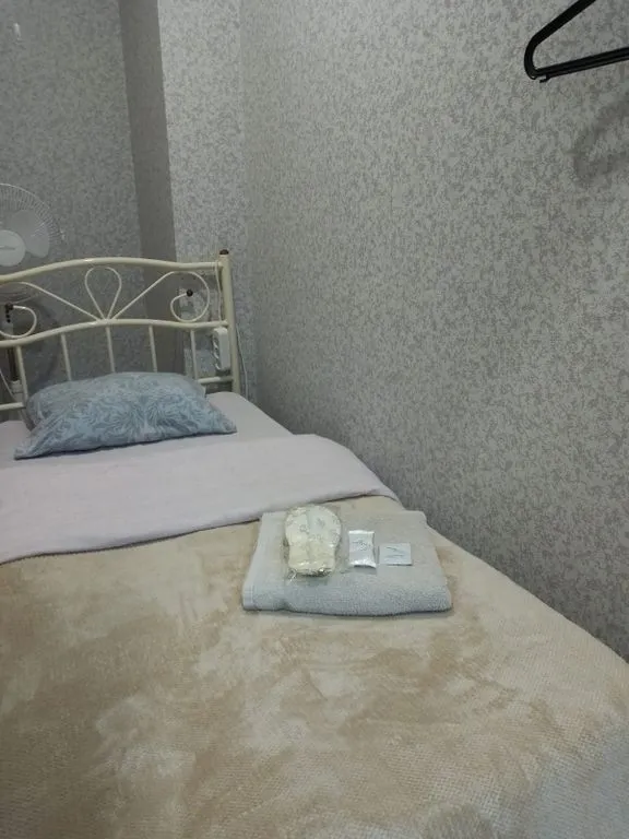 Одноместный номер без окна с общими удобствами