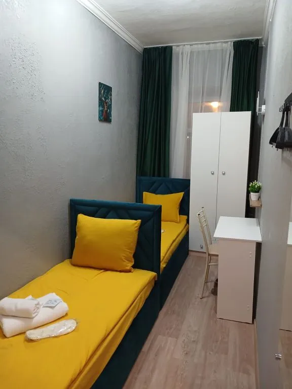 Двухместный номер с 2 отдельными кроватями без удобств