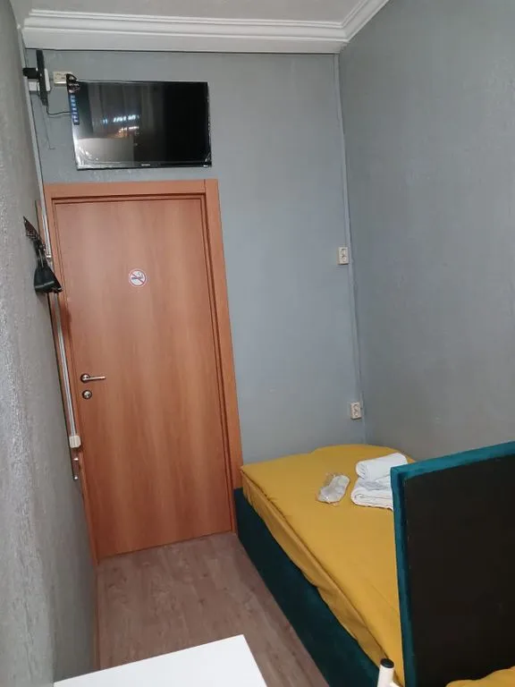 Двухместный номер с 2 отдельными кроватями без удобств